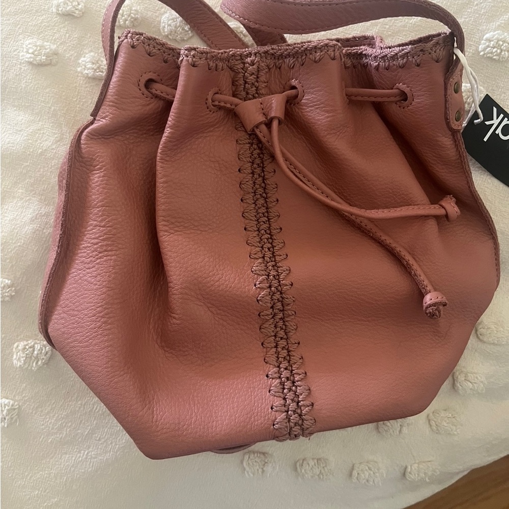 The Sak purse. Brand new. Crossbody leather. Rose pink colour. NWT.